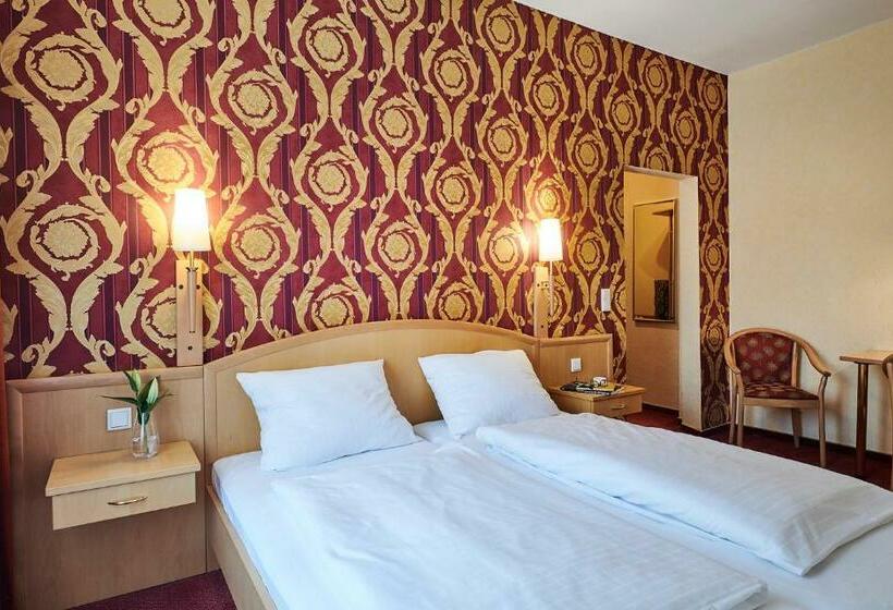 Quarto Estandar Individual, Dom