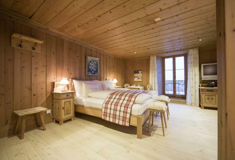 Полулюкс, Relais & Châteaux In Lain Hotel Cadonau