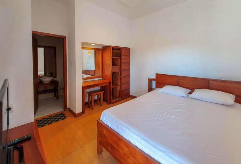 Номер Deluxe, Rumah Eyang Tardjo Syariah Mitra Reddoorz