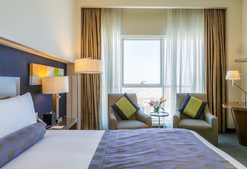 Quarto Deluxe, Grand Millennium Al Wahda Hotel And Executive Apartments Abu Dhabi
