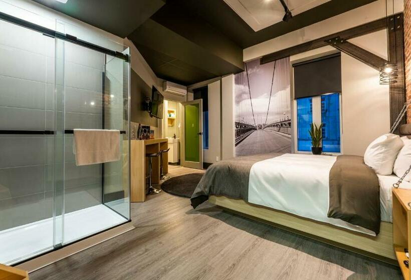 Quarto Deluxe, La Suite Hébergements