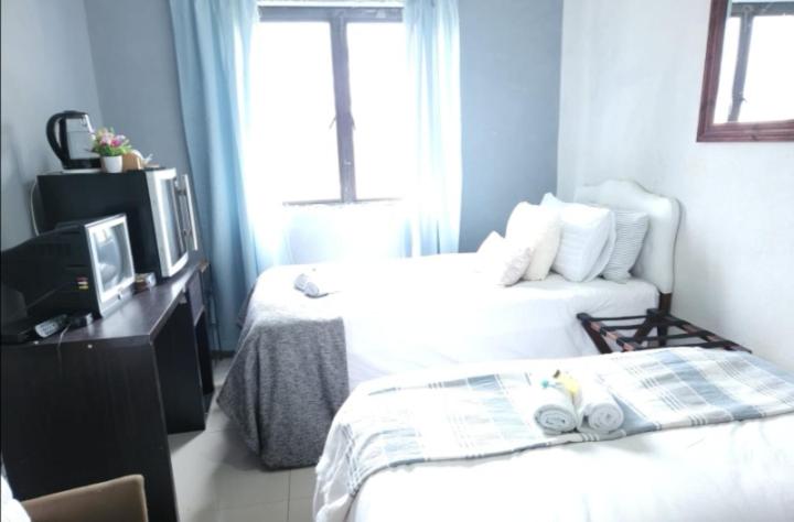 带共用浴室的标准房间, Thokazi Haven Guest House & Backpacker