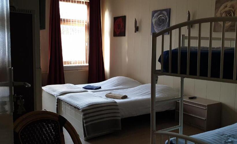 חדר סטנדרט לארבעה, De Zevende Hemel