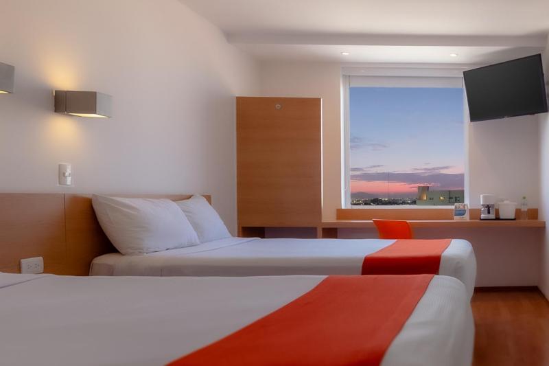 Quarto Quádruplo Estandar, Sleep Inn Leon Antares