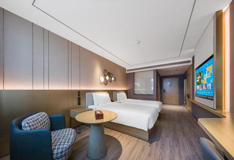 Номер Deluxe, Orange Hotel   Jiaozhou Jiaodong International Airport Jiaodong Subway Station