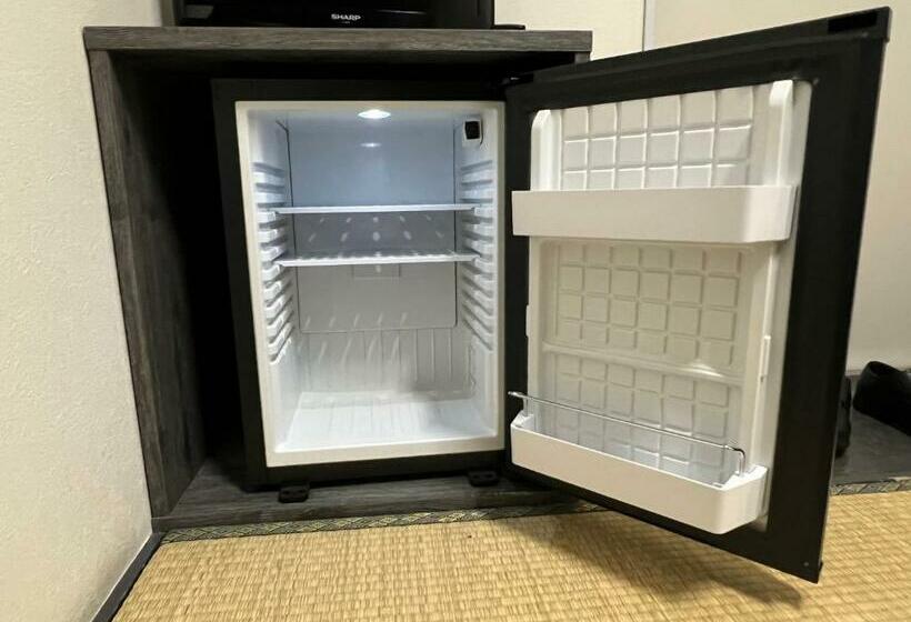 Quarto Economy Banheiro Compartilhado, Zipang