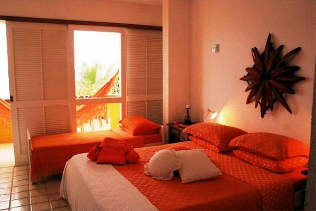 Habitación Triple Estándar Vista Mar, Pousada Casa Do Bicho Preguiça