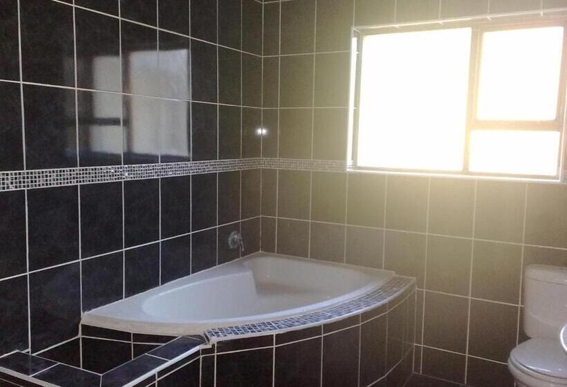 Chambre Quadruple Deluxe, Tyday Accommodation