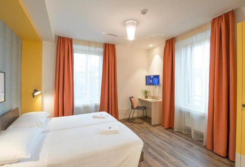 Номер Стандарт, Pestalozzi Lugano