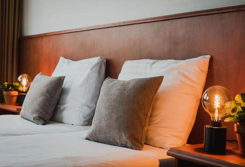Chambre Economy, Riche