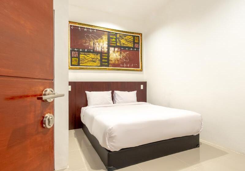 Номер Deluxe, Urbanview Os Residence Medan By Reddoorz