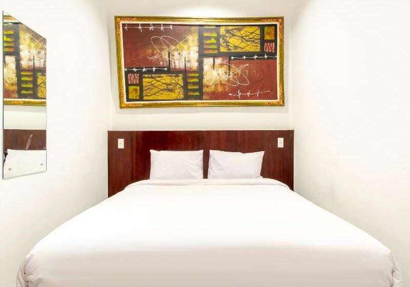 Номер Deluxe, Urbanview Os Residence Medan By Reddoorz