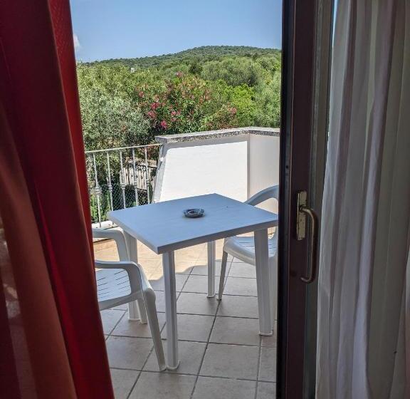 Escritório Estándar, Residenze Il Girasole