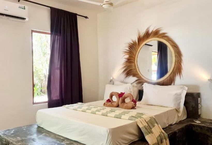 Номер Deluxe Вид на Море Боковой, Garden Beach Bungalows Jambiani