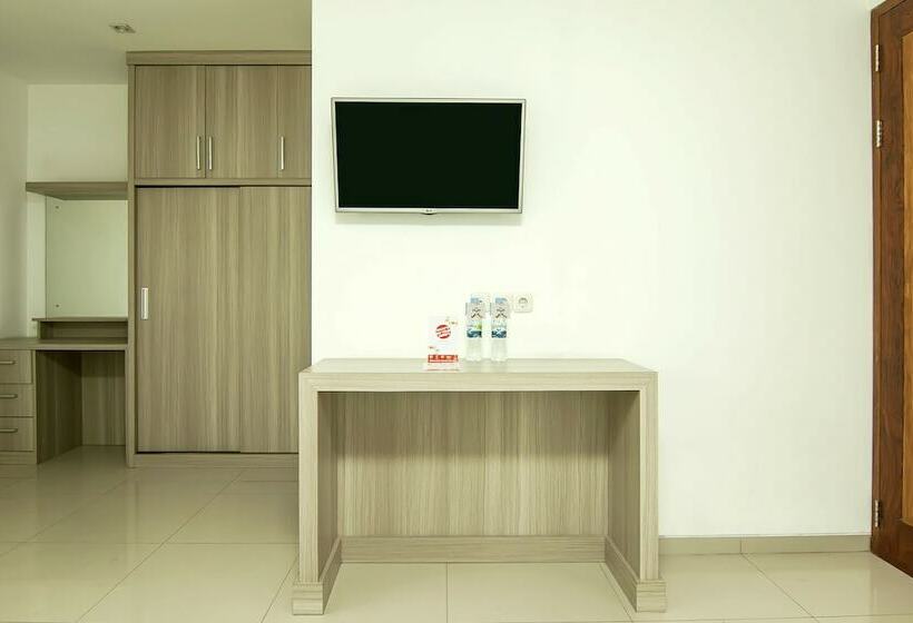 Номер Deluxe, Puri Gevana Guest House By Oyo