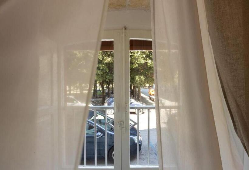 חדר לארבעה סטנדרטי עם נוף לגינה, B&b La Finestra Sui Giardini