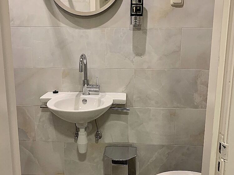 Habitació Triple Estàndard, Damrak Inn