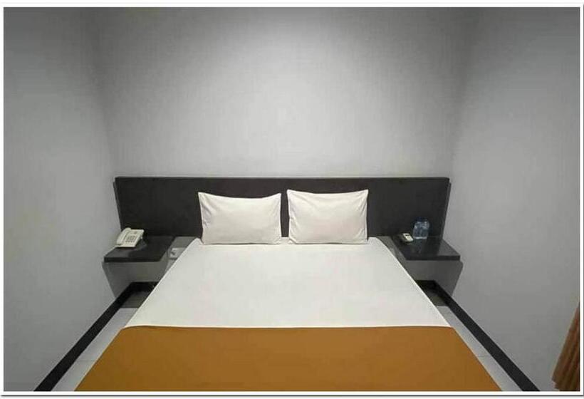 Номер Economy, Losmen Family Syariah Bypass Juanda Mitra Reddoorz
