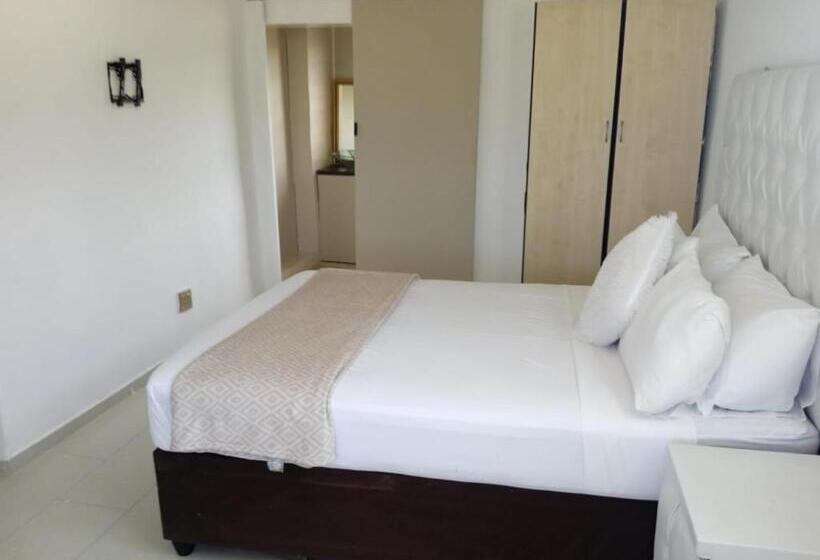 Quarto Estandar Vista Jardim, La Saville Bnb