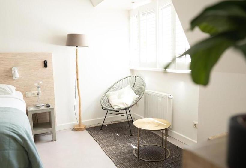 컴포트 스위트, Logement Overzee