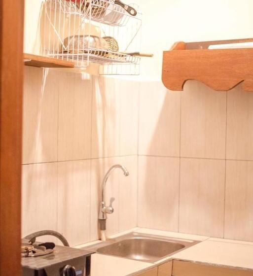디럭스 룸, Kamar Suci House