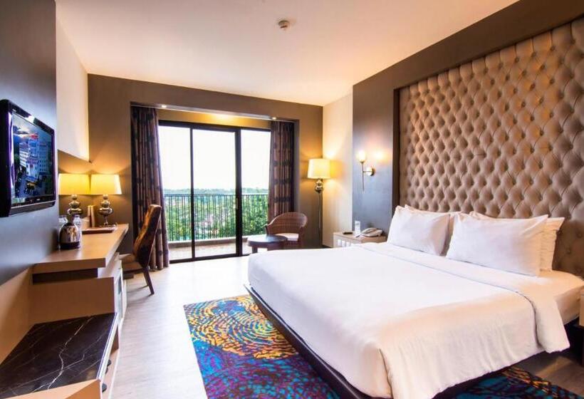 キングサイズベッドのデラックスルーム, Grand Rocky Hotel Bukittinggi