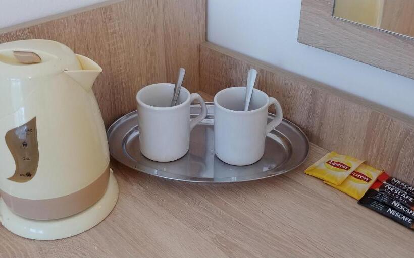 Quarto Quadruple Standart com Varanda, Riwiera Dźwirzyno