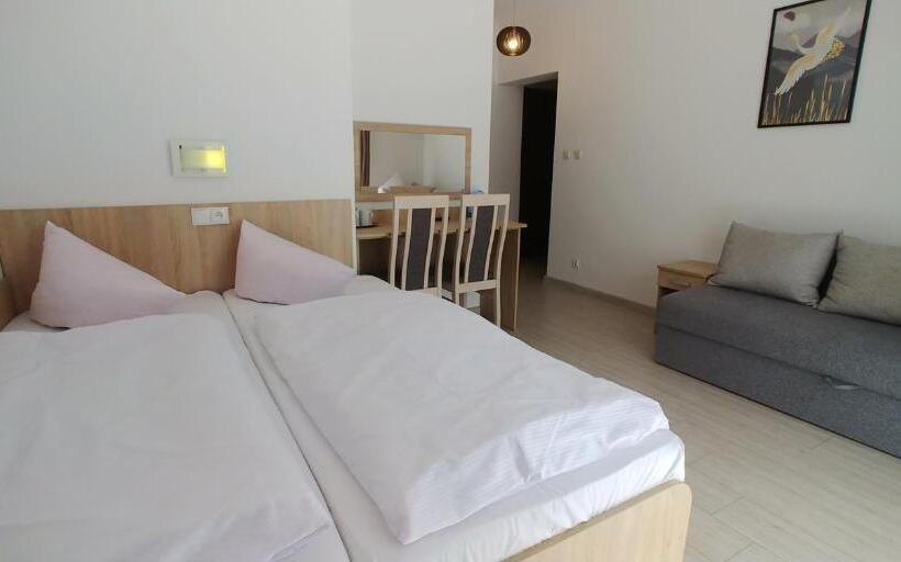 Quarto Triplo Estandar com Sacada, Riwiera Dźwirzyno