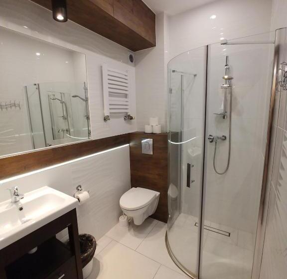 Quarto Quadruple Standart com Varanda, Riwiera Dźwirzyno