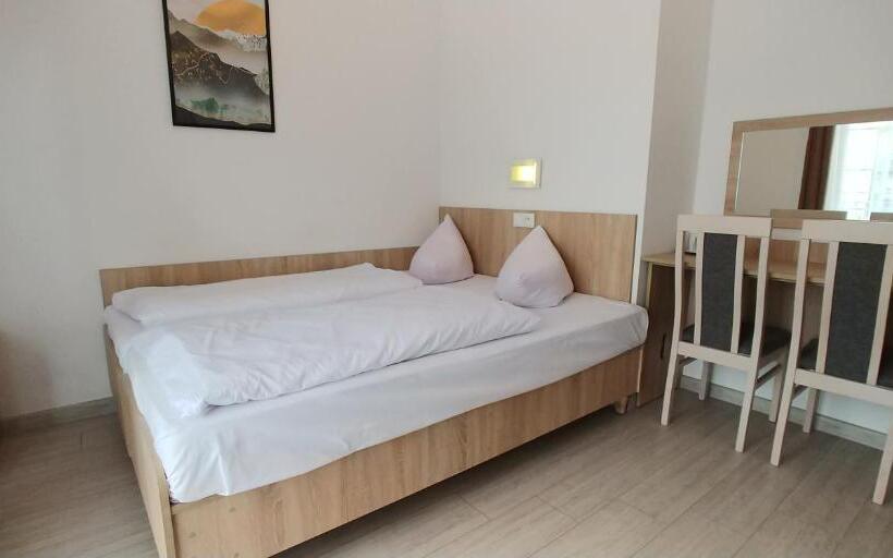 Quarto Quadruple Standart com Varanda, Riwiera Dźwirzyno