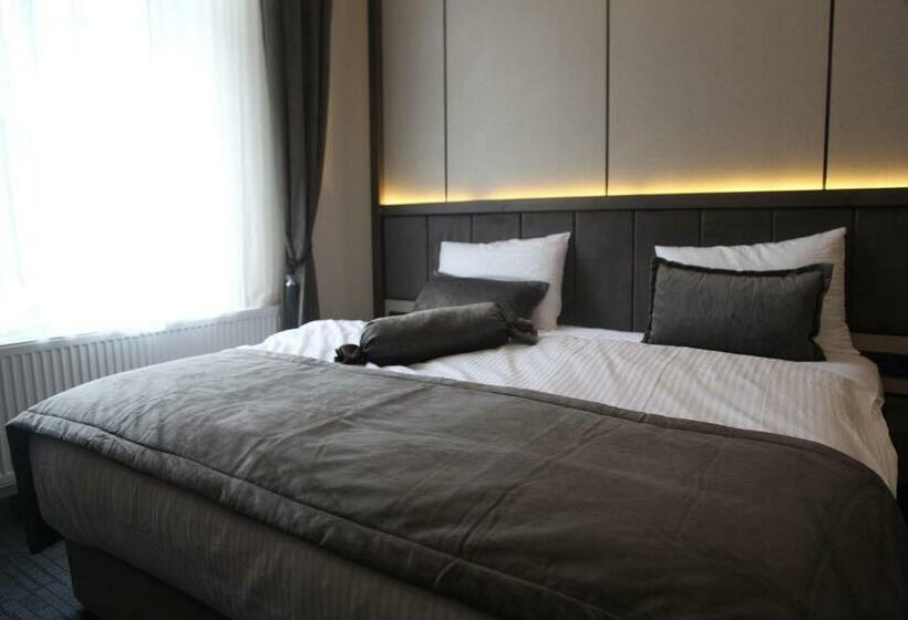 Номер Deluxe, Münden