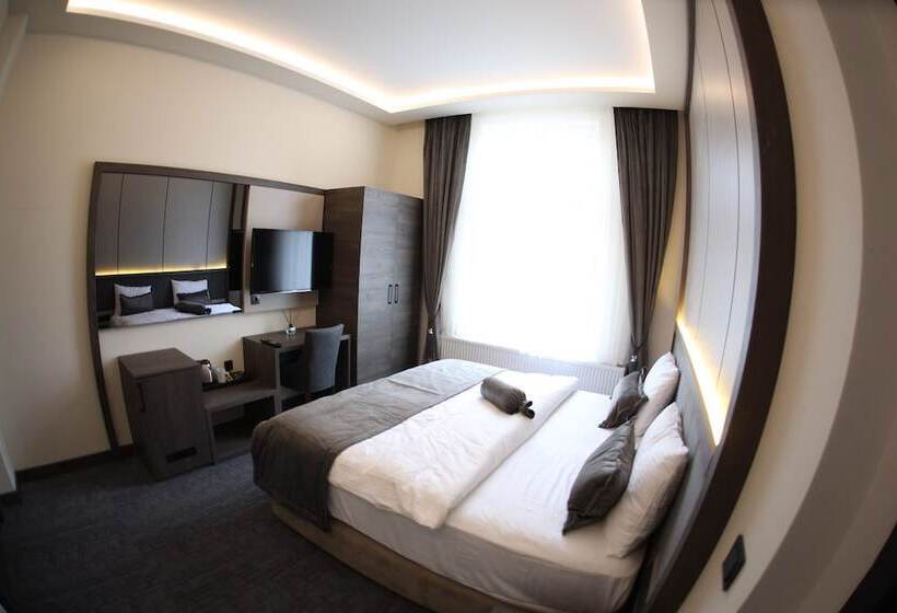 Номер Deluxe, Münden