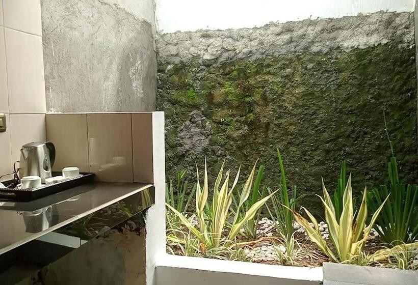 キングサイズベッドのデラックススイート, Cersen Resort Lombok