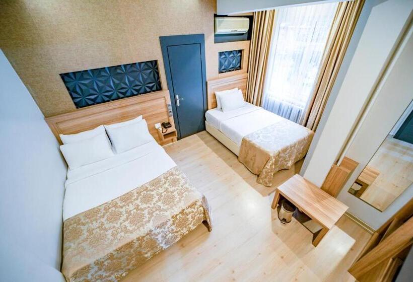 Quarto Triplo Standard Vista Jardim, Aksular