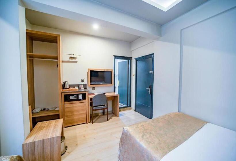 Quarto Triplo Standard Vista Jardim, Aksular