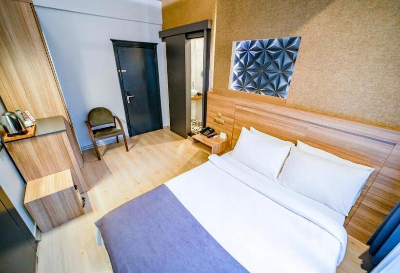 Quarto standart vista jardim, Aksular