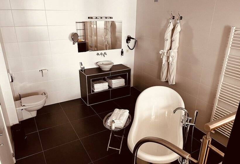Номер Deluxe, Het Heilig Genot