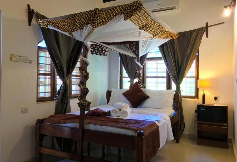 غرفة قياسية مزودة بشرفة مطلة على الحديقة, Jambiani White Sands Bungalows