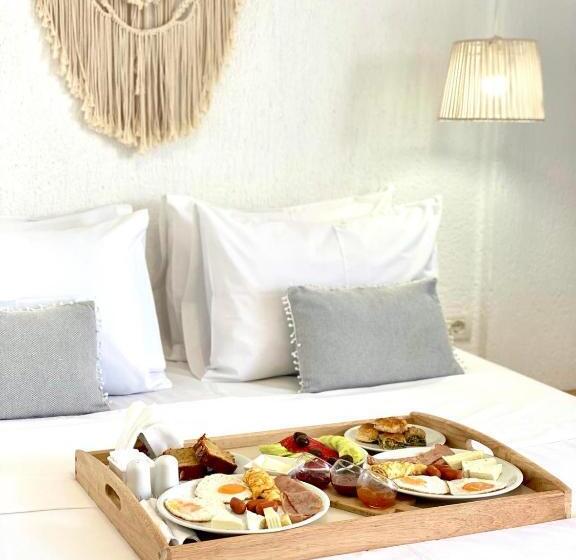 Quarto Triplo Deluxe, Geo & Art Boutique