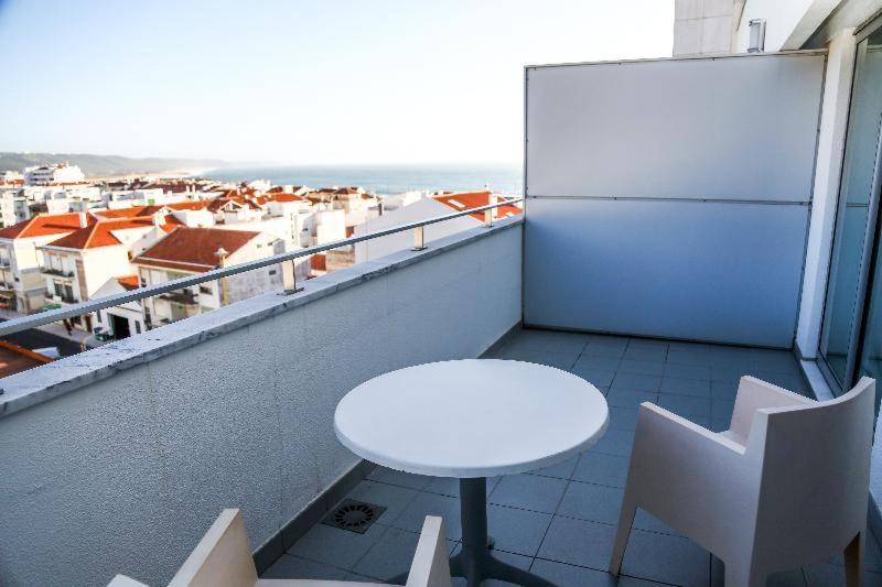 Habitación Estándar, Praia