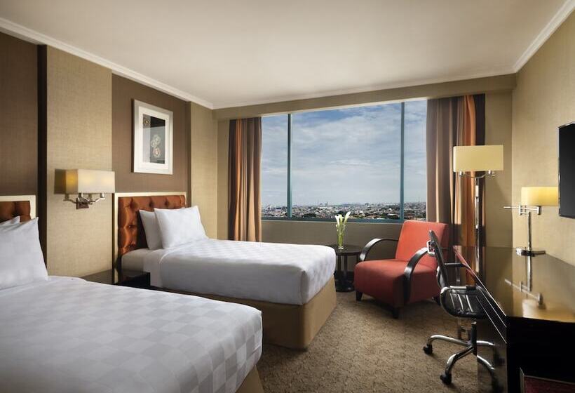 Номер Deluxe, Ciputra Semarang Managed By Swiss Belhotel International
