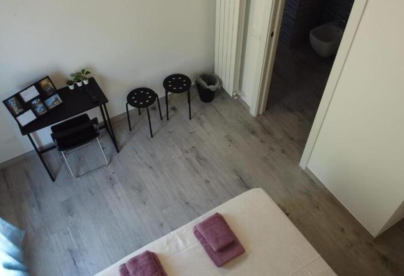 Quarto Triplo Estandar Vista Jardim, Agriturismo Cascina Lert