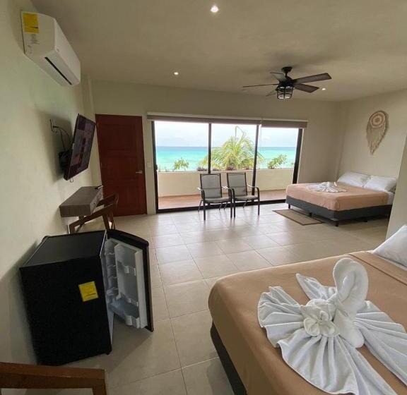 غرفة قياسية رباعية مطلة على البحر, Cuxos Hotel Beachfront