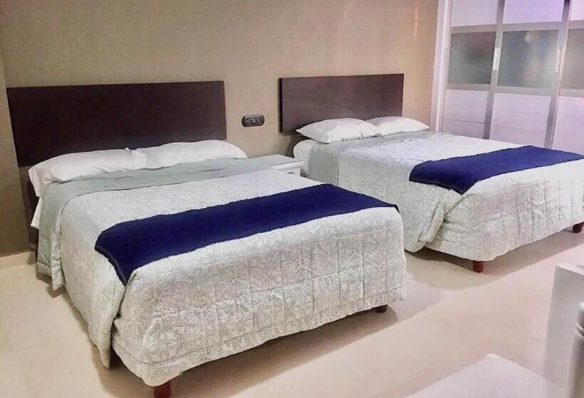Quarto Familiar Vista Jardim, Marina Suites By Andiani Travel