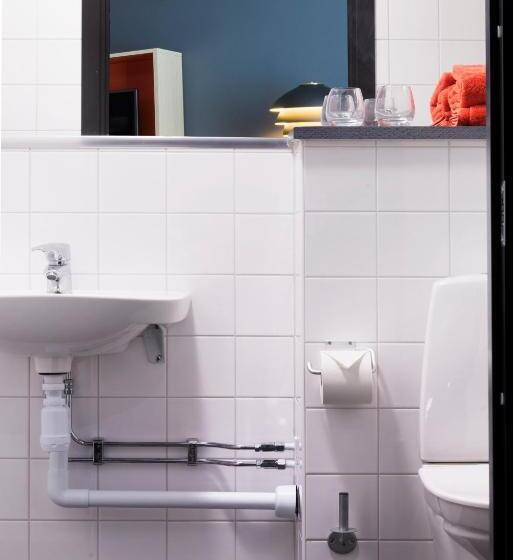 quarto Deluxe Adaptado para Deficientes Físicos, First Hotel Central