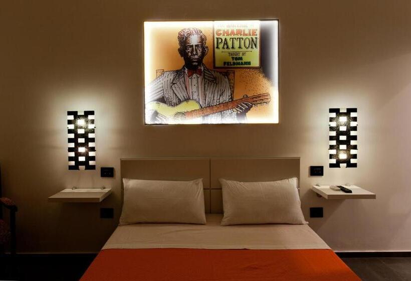 Quarto Deluxe, Bed & Blues