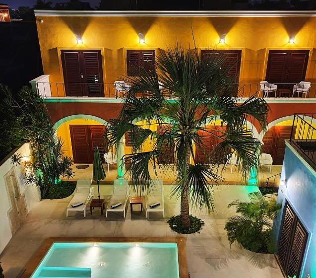 מיטת קינג בסוויטה, Merida Santiago Hotel Boutique