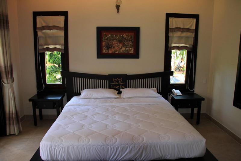 اتاق استاندارد با چشم‌انداز باغ, Lotus Village Resort