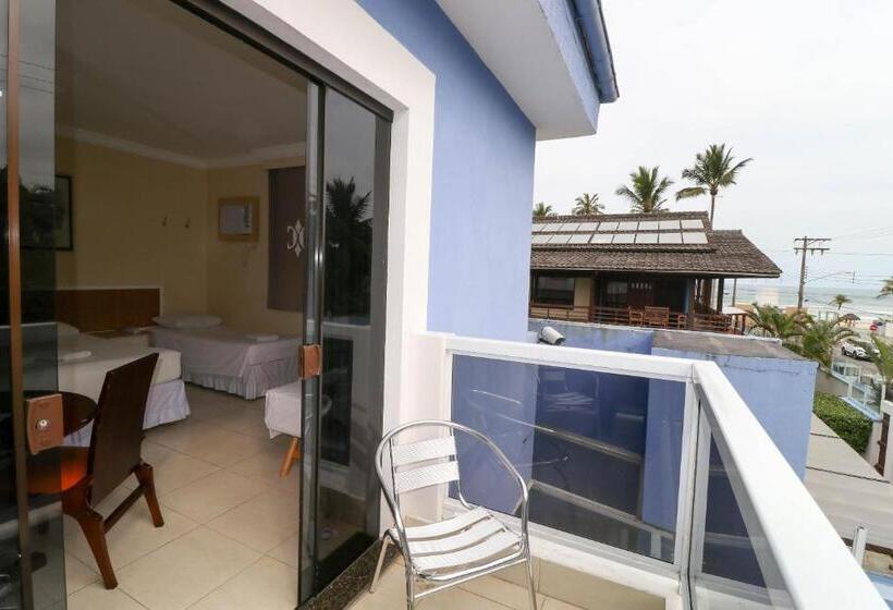 اتاق استاندارد چهارنفره با چشم‌انداز جانبی دریا, Charme Hotel Guarujá Frente Mar