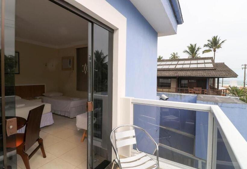 اتاق استاندارد چهارنفره با چشم‌انداز جانبی دریا, Charme Hotel Guarujá Frente Mar